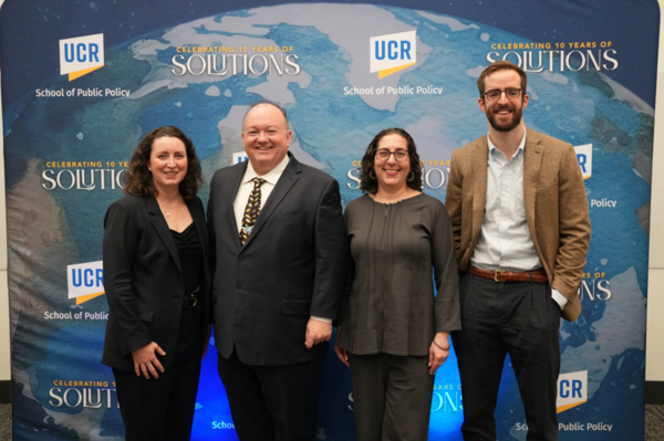 A group photo of Panelist Liza Reed, Dean Mark Long, Panelist Sara Mogulescu, and Panelist Alec Stapp